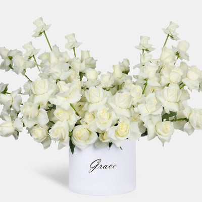 100/101 Elegance White Roses in Box