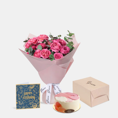 Flowers with Greetings Card and Birthday Cake