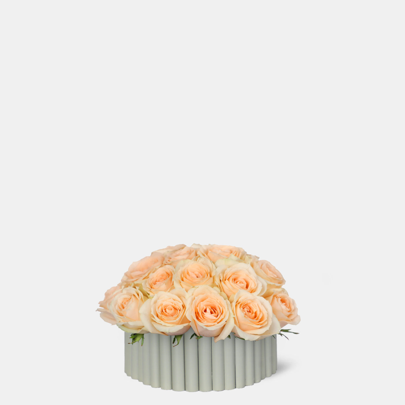 Peach Roses in wooden vase